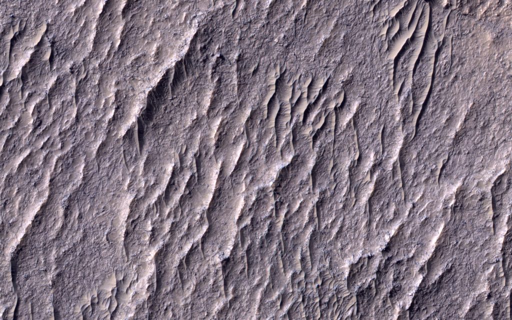 HiRISE image of old and modern windblown dune-like features on Mars.
